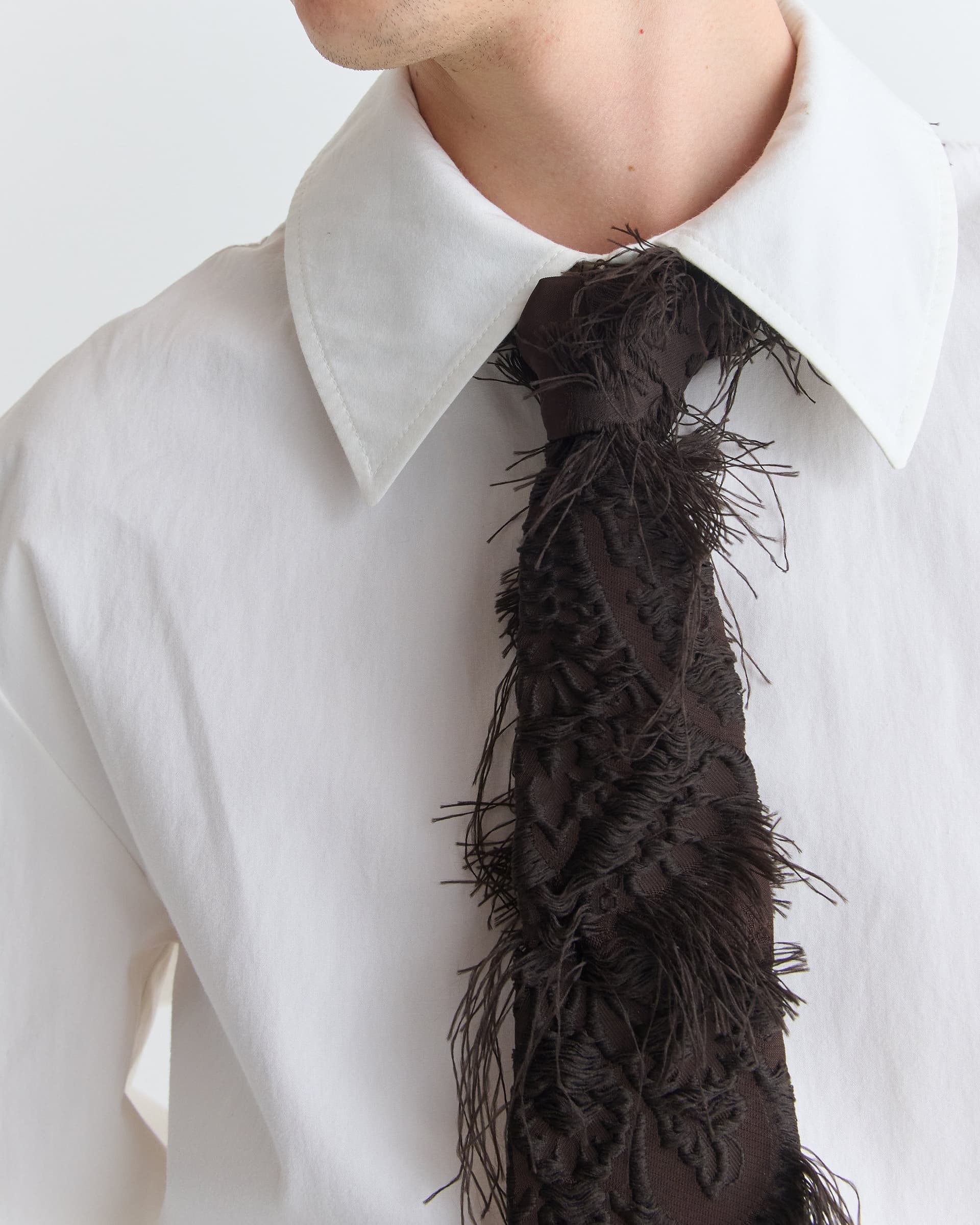 1496_6cc0755324-22_lyria_tie_fringed_black_vis_1478-large