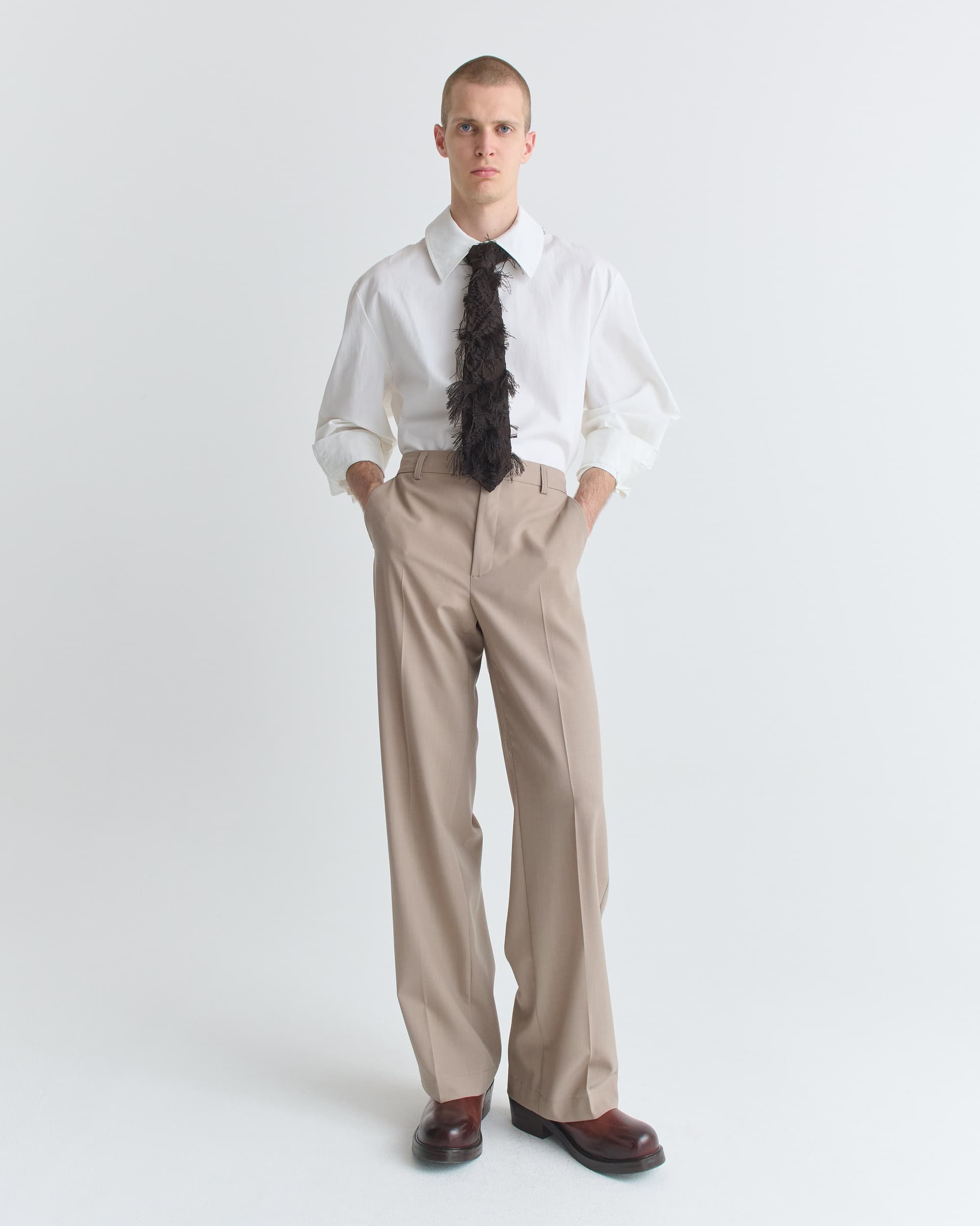 1496_f5236e34ed-22_lyria_tie_fringed_black_vis_1467-large