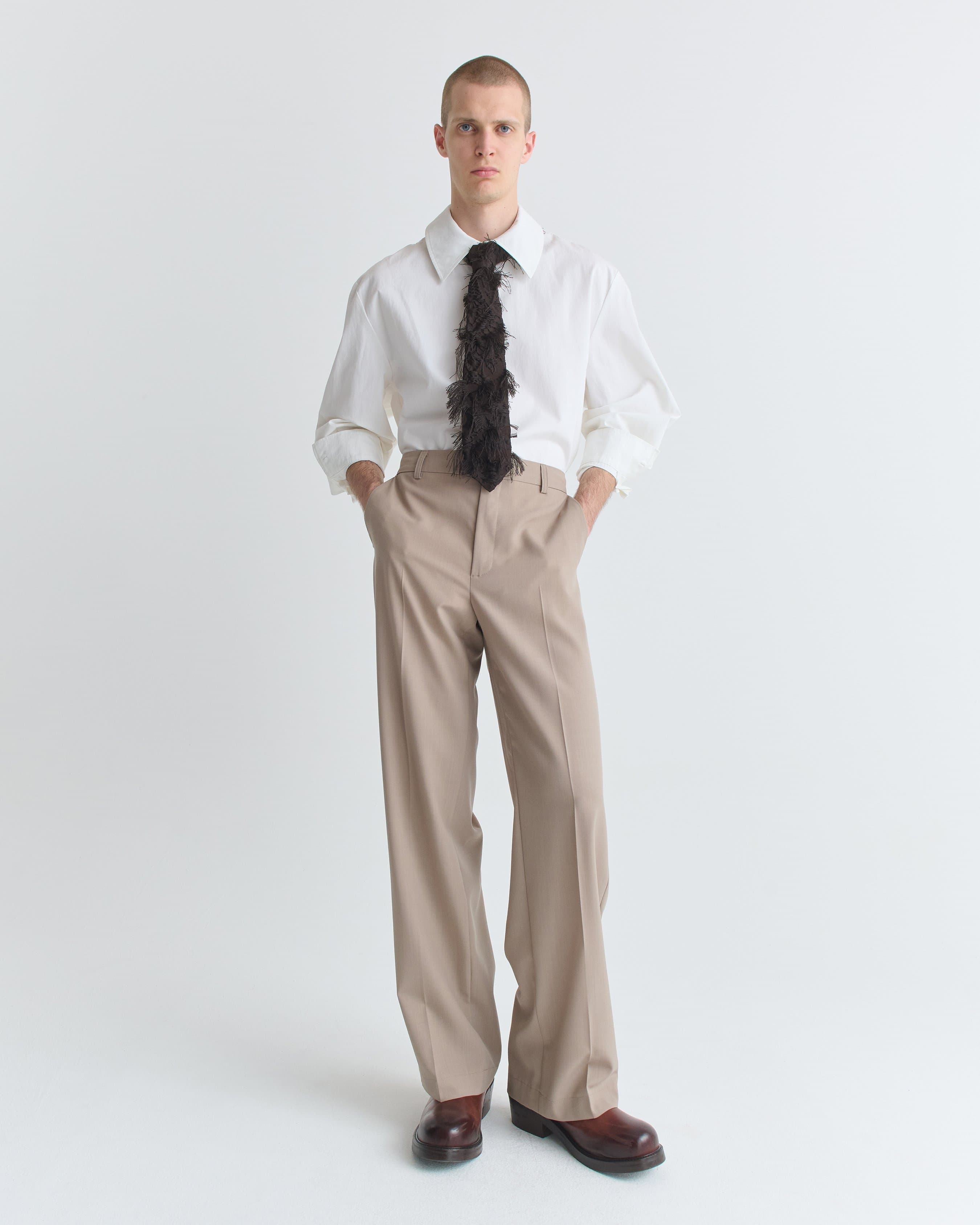 1496_f5236e34ed-22_lyria_tie_fringed_black_vis_1467-large