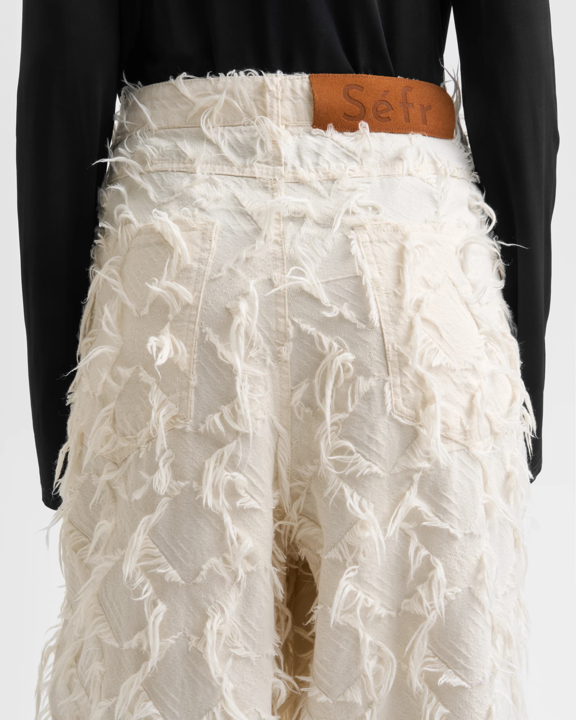 1590_262dcca985-sefr_fw26_loose-cut-fringed-white-twill_0157-large