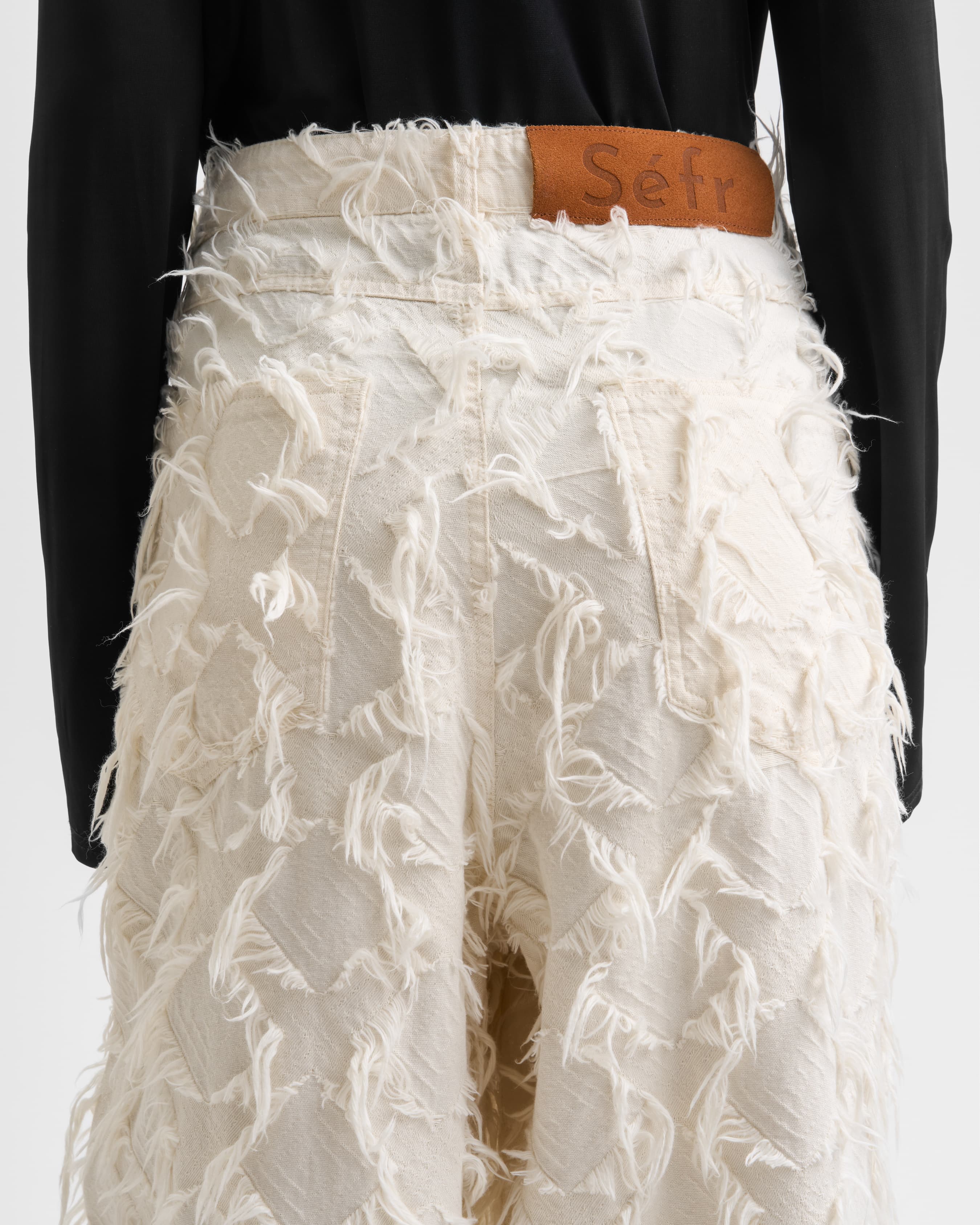 1590_262dcca985-sefr_fw26_loose-cut-fringed-white-twill_0157-large