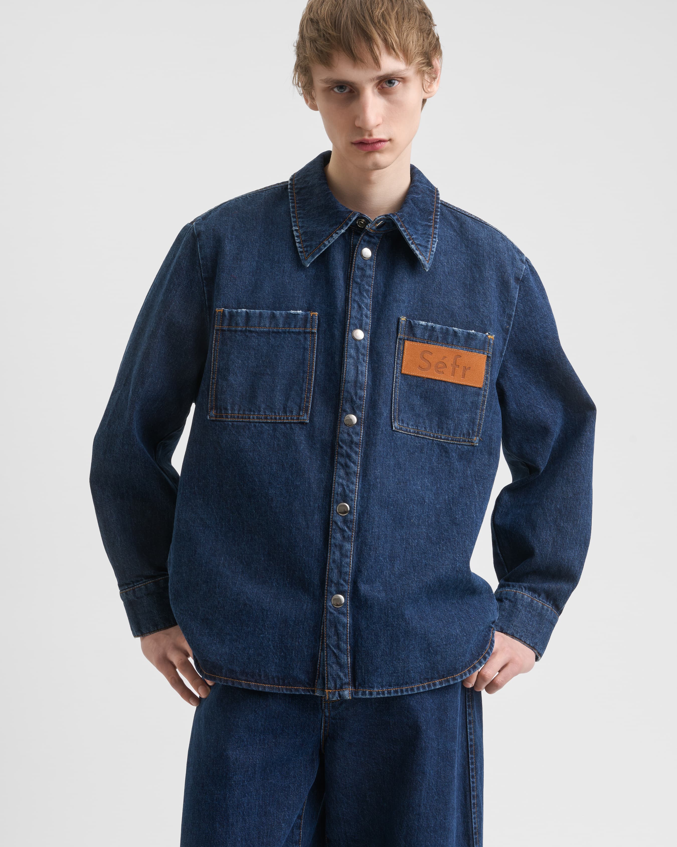 1721_8f2145af78-sefr_fw26_denim-staff-overshirt-dark-blue-wash_9857-large