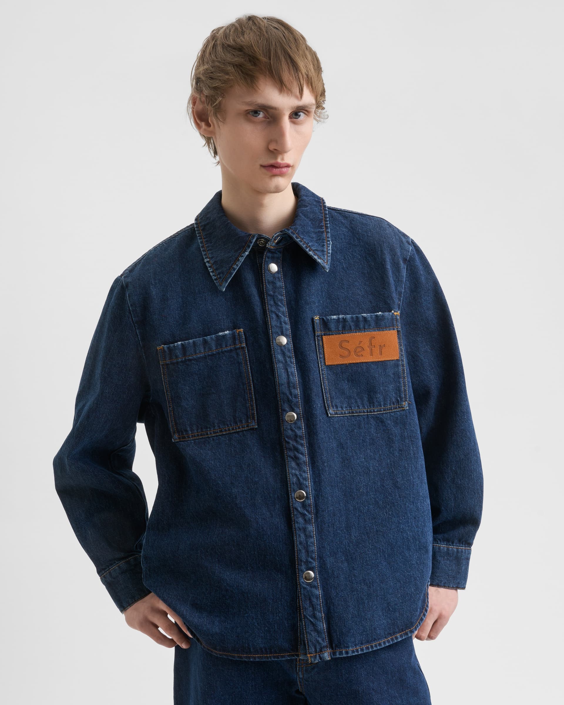 1721_f82d8033c3-sefr_fw26_denim-staff-overshirt-dark-blue-wash_9865-large
