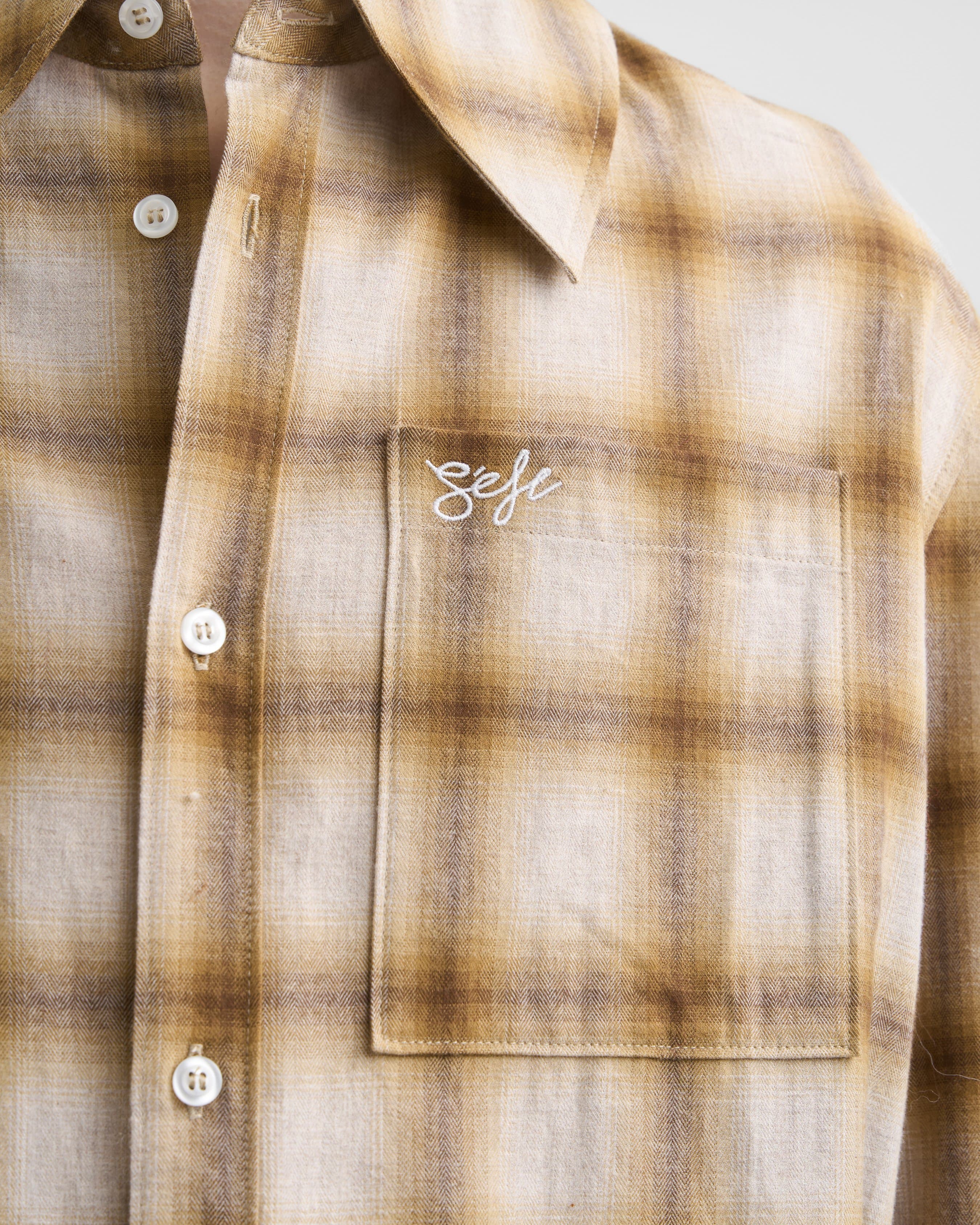 1736_06a21047ff-sefr_fw26_relaxed-flannel-shirt-beige-brown-check_8749-large