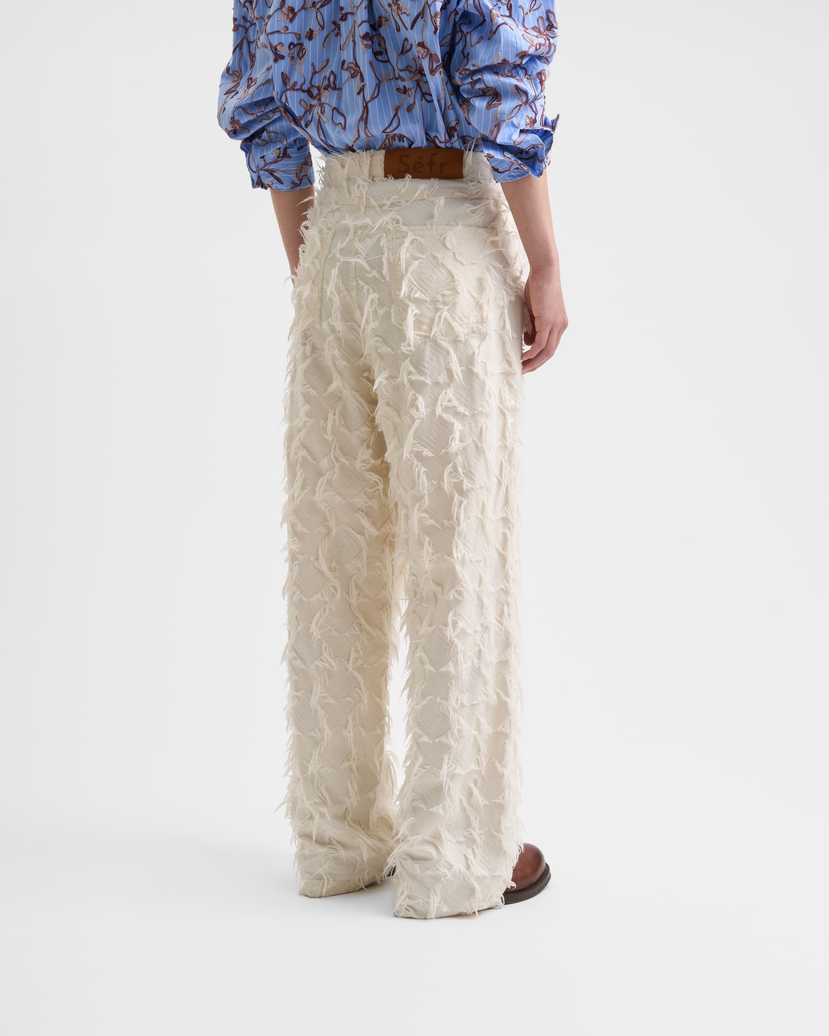 1747_fe36549f84-sefr_fw26_nikos-jeans-fringed-white-twill_6478-large