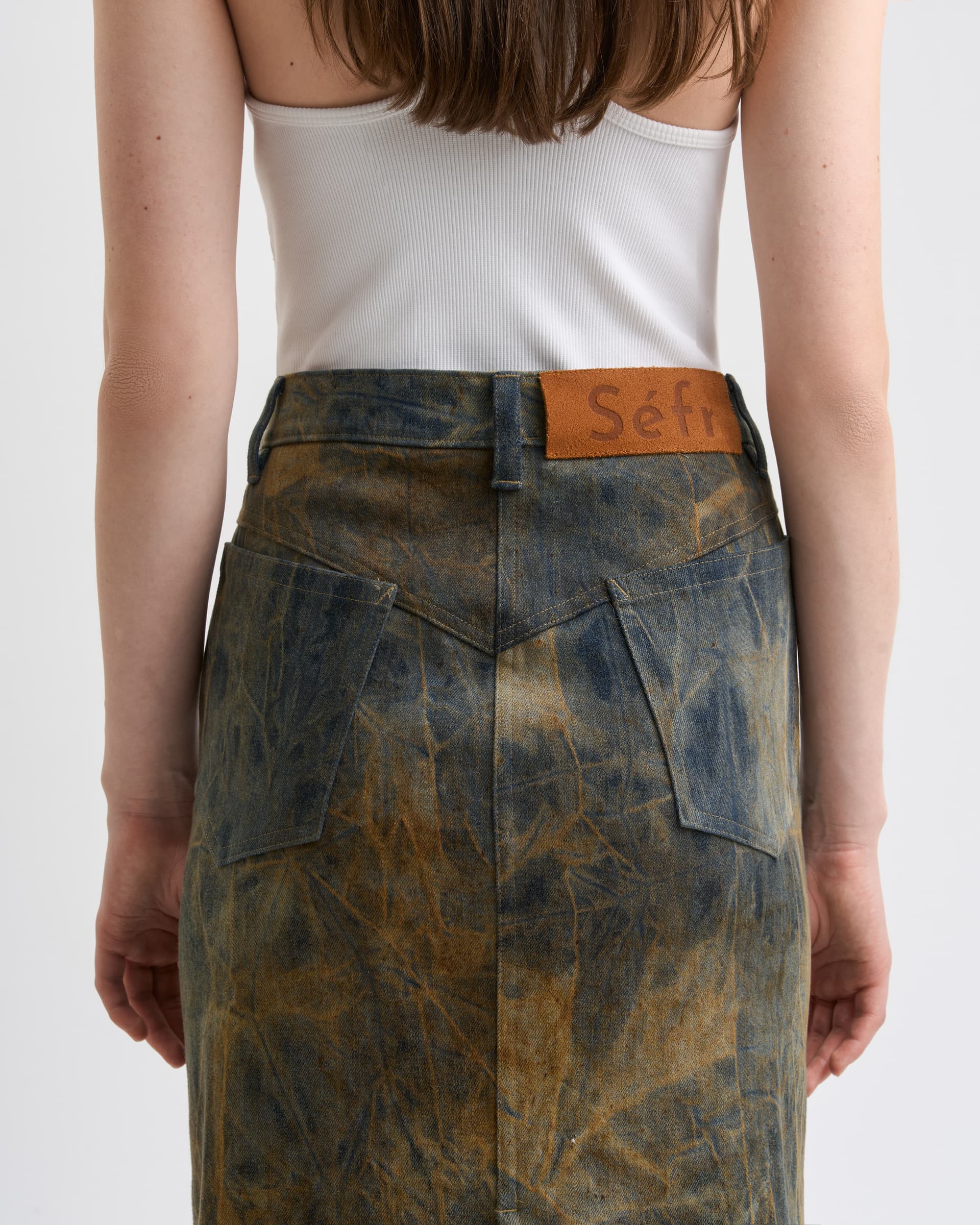 1769_207a67e801-sefr_fw26_over-dyed-denim-skirt-muted-neuterals_4253-large