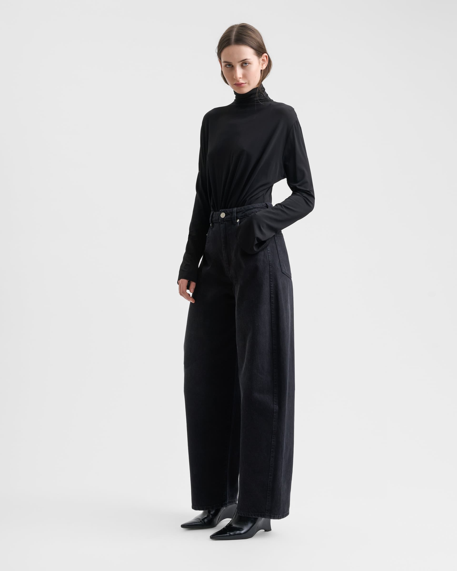 1778_b0b11e84ef-sefr_fw26_draped-turtleneck-top-black_1984-large