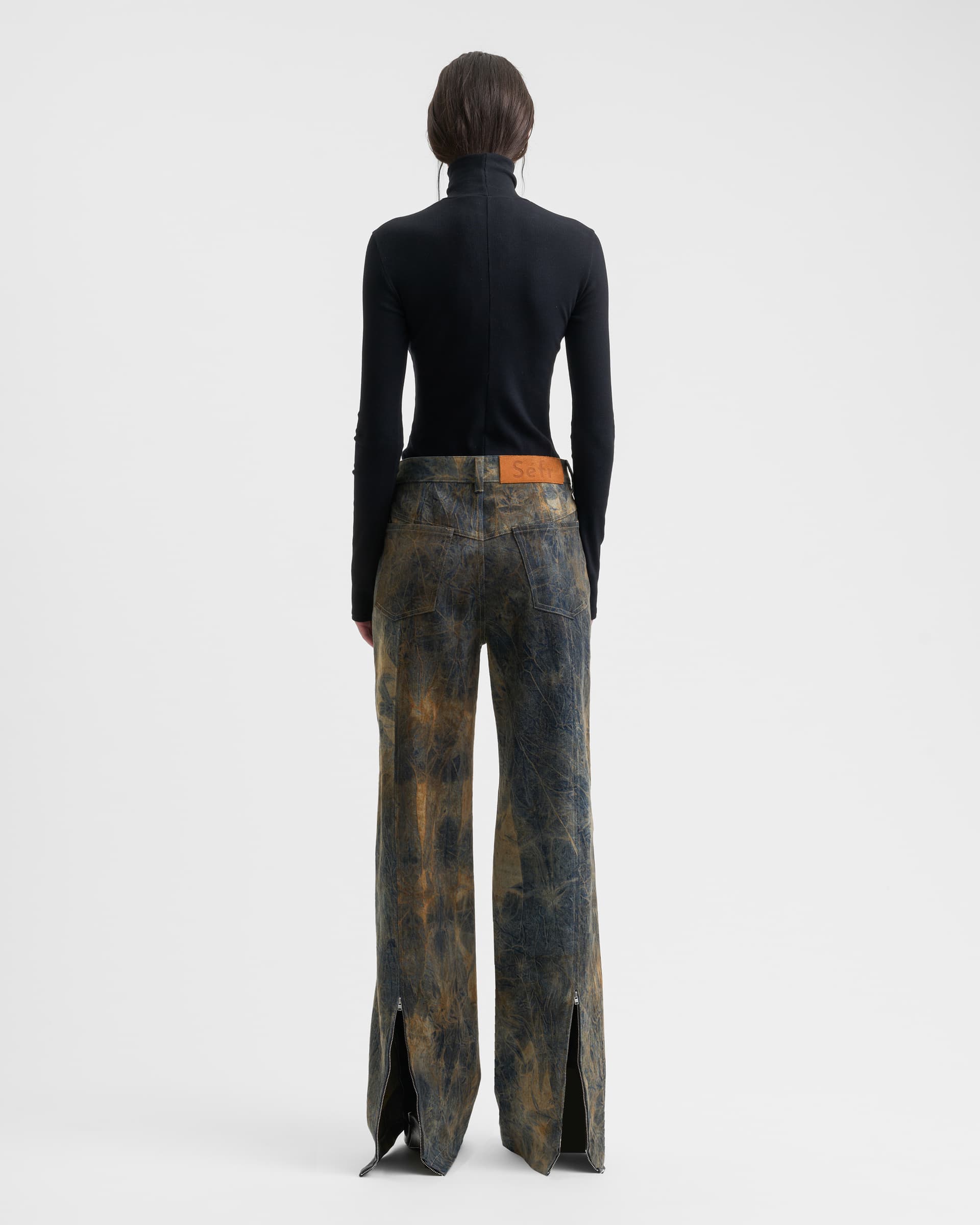 1779_cbc7c4bd8a-sefr_fw26_over-dyed-back-slit-jeans-muted-neuterals_-8955-large